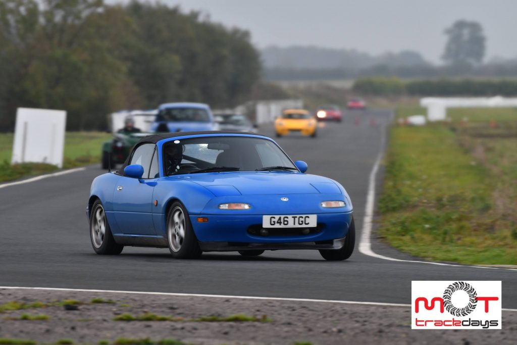 Eunos Roadster in Blyton Park leading the pack.